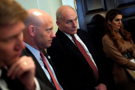 (L-R) Nick Ayers, Chief of Staff to U.S. ‪Vice President Mike Pence, White House Director of Legislative Affairs Marc Short, White House Chief of Staff John Kelly, and White House Communications Director Hope Hicks watch as ‬U.S. President Donald Trump holds a cabinet meeting at the White House in Washington, U.S., December 20, 2017. REUTERS/Jonathan Ernst