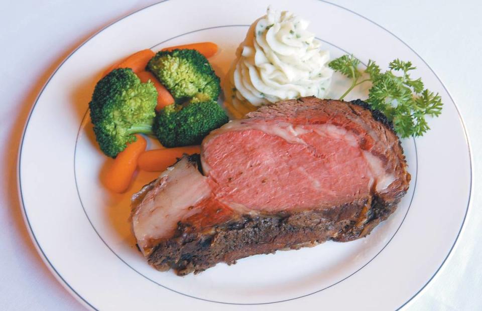 Slow-roasted prime rib with potato and vegetable of the day is a signature dish at Crane’s Tavern. Pictured Feb. 5, 2008.