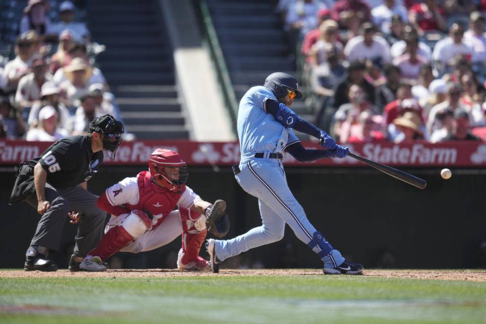 Toronto Blue Jays' Kevin Kiermaier drives in two-runs with a triple during the sixth inning of a baseball game against the Los Angeles Angels Sunday, April 9, 2023, in Anaheim, Calif. (AP Photo/Marcio Jose Sanchez)