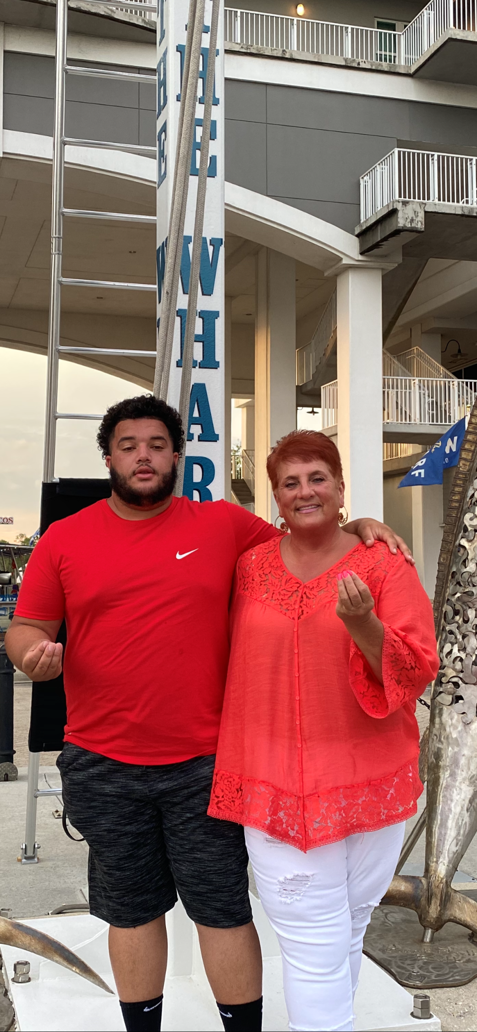 Tammy Barrett, left, poses with her son Dallas "DJ" Barrett in this undated photo.