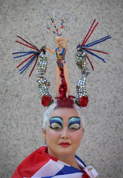 Juliet Cooke wears a hair sculpture depicting a Team GB medal winner on August 9, 2012 in London, England. Created by Catalonian performance artists Osadia, these sculpted hair pieces are a tribute the success of Team GB in the London 2012 Olympics and will be touring London as part of Showtime a large London outdoor arts festival. (Photo by Peter Macdiarmid/Getty Images)