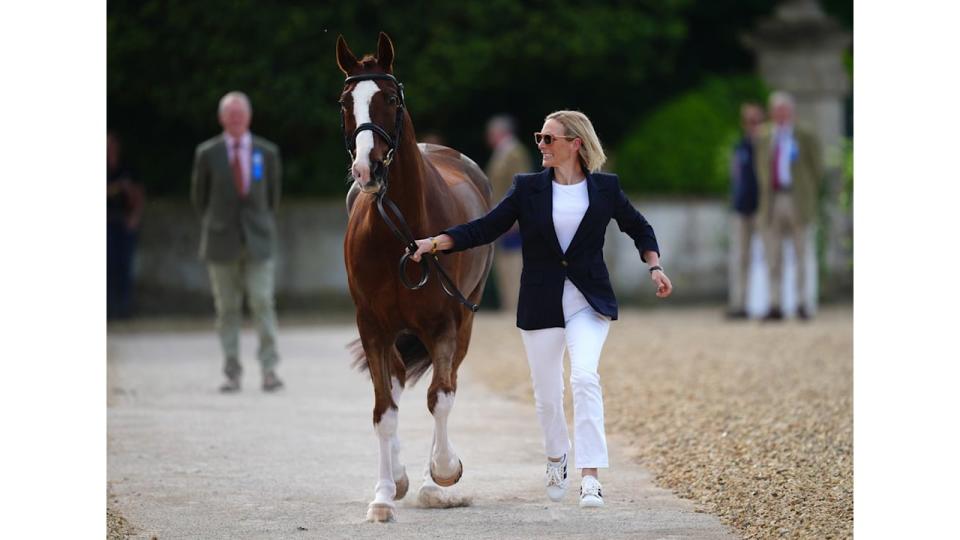 Zara running with brown horse