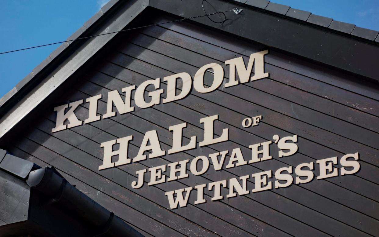 A judge ruled that a Jehovah's Witness could only take his son to Kingdom Hall for up to two hours on a Sunday  - www.alamy.com