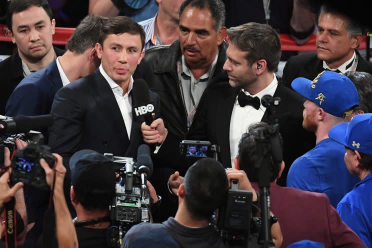 Middleweight champion Gennady Golovkin (L), with trainer Abel Sanchez (center), faces Canelo Alvarez on Sept. 16 at T-Mobile Arena in Las Vegas. (Getty Images)