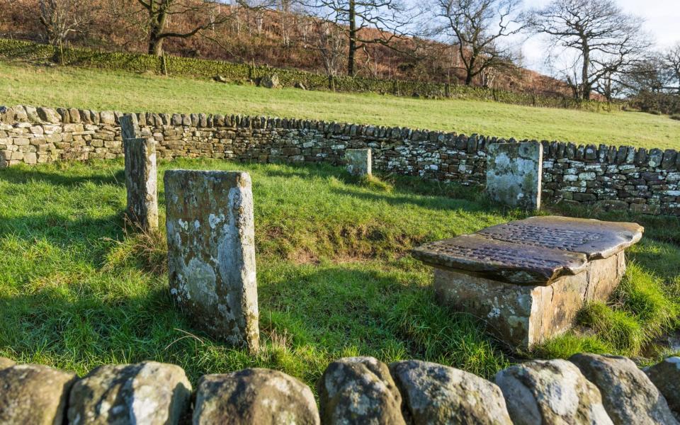 Families were told to bury their dead in fields, rather than the village graveyard, leaving tiny plots of ancient stones scattered around the landscape  - Getty Images