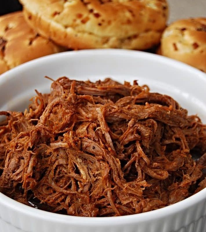 <p>Krista Marshall</p><p>Rubbed down with a flavorful seasoning blend, chilled overnight and then slow-cooked makes this brisket the best thing to happen to a bun in ages.</p><p><strong>Get the recipe: <a href="https://parade.com/842178/kristamarshall/slow-cooker-bbq-brisket-2/" rel="nofollow noopener" target="_blank" data-ylk="slk:Slow Cooker BBQ Brisket;elm:context_link;itc:0;sec:content-canvas" class="link rapid-noclick-resp">Slow Cooker BBQ Brisket</a></strong></p>