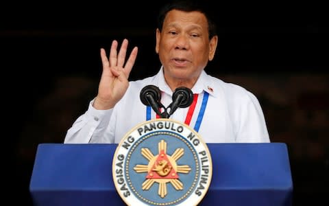 Philippine President Rodrigo Duterte has been criticised for is war on drugs - Credit: Erik de Castro/AFP
