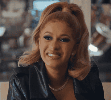 Cardi B doing a cringe face on Saturday Night Live