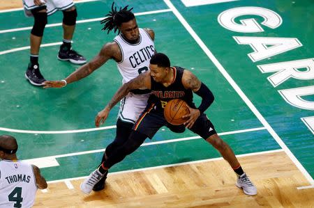 Apr 22, 2016; Boston, MA, USA; Boston Celtics forward Jae Crowder (99) defends against Atlanta Hawks forward Kent Bazemore (24) during the fourth quarter in game three of the first round of the NBA Playoffs at TD Garden. Mandatory Credit: David Butler II-USA TODAY Sports