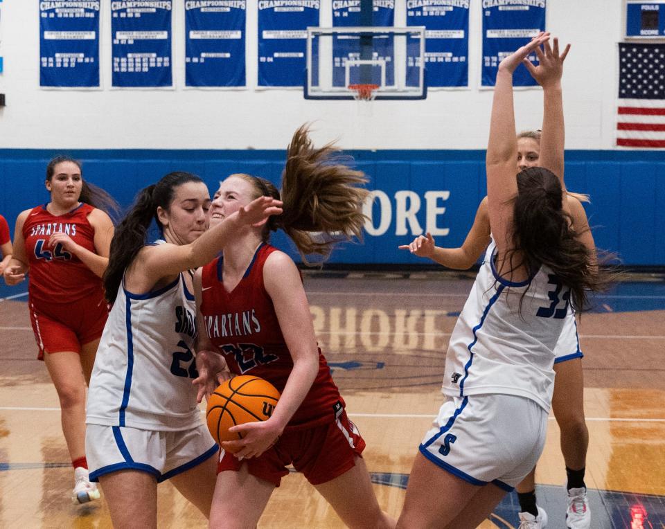 Ocean Eli Clark drives to the basket.  Shore Regional Girls Basketball defeats Ocean Top High School  in West Long Branch on January 12, 2023.