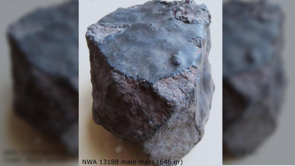 An uneven dark rock