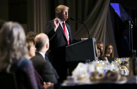 U.S. President Donald Trump delivers remarks at the National Prayer Breakfast in Washington, U.S., February 2, 2017. REUTERS/Carlos Barria