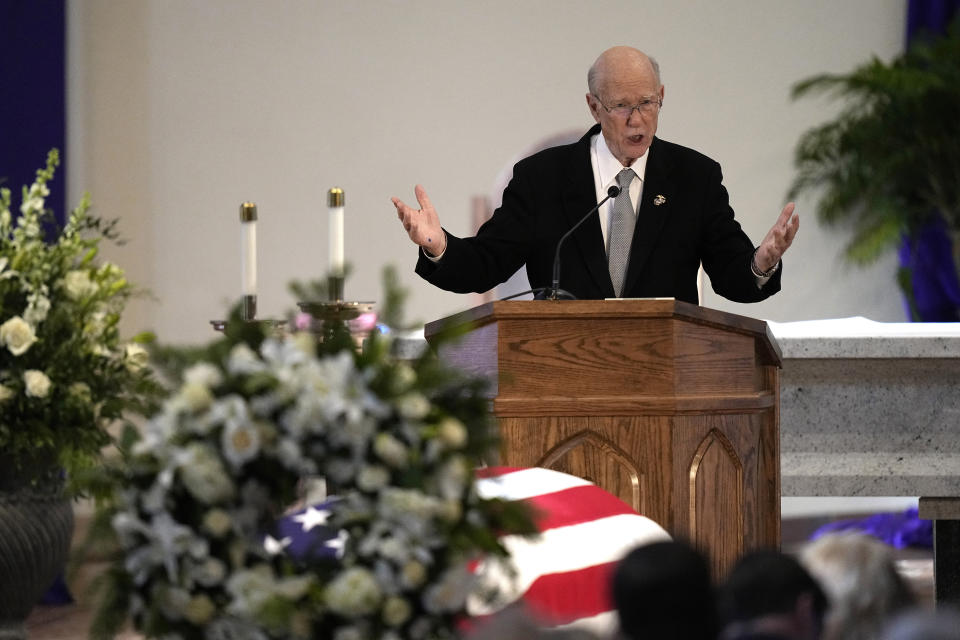 Former Sen. Pat Roberts, R-Kan., speaks during a memorial service for former Sen. Bob Dole, R-Kan., Saturday, Dec. 11, 2021, in Russell, Kan. (AP Photo/Charlie Riedel)