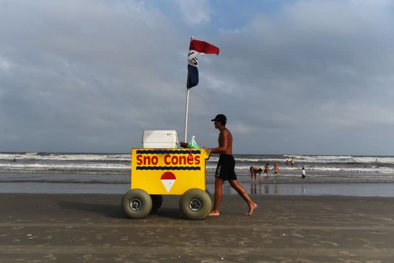 People flock to the beach after coronavirus disease (COVID-19) restrictions were lifted in time for the Memorial Day weekend in Galveston