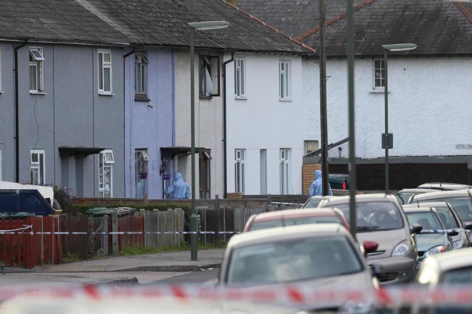 Search: Forensic officers taking part in an operation in Sunbury-on-Thames (PA)