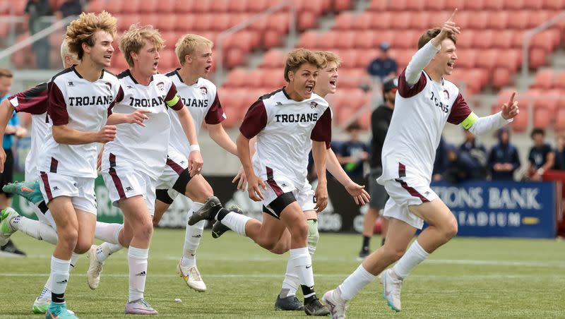 Morgan players celebrate after beating Ogden in penalty kicks in a 3A boys soccer state semifinal at Zions Bank Stadium in Herriman on Wednesday, May 10, 2023.