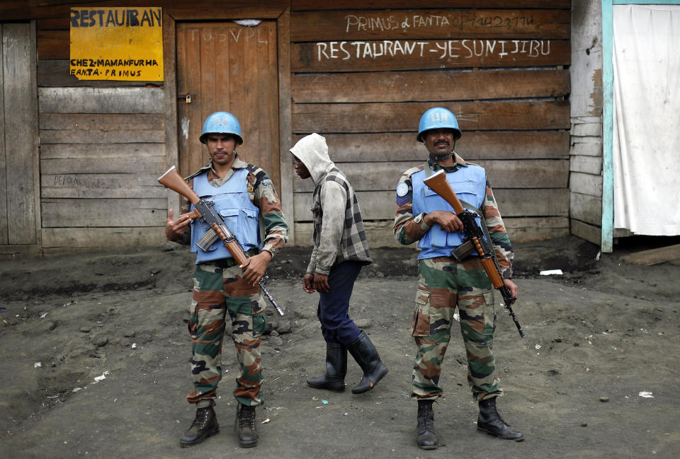 FILE - UN soldiers stand guard in Goma, Democratic Republic of Congo, on Nov. 30, 2012. The United Nations Peacekeeping efforts is under resourced as its $5.5 billion budget for worldwide operations is less than the New York Police Department's $6.1 billion budget, even though it has 30,000 more personnel, the UN Under-Secretary General, Peace Operations Jean-Pierre Lacroix said Wednesday, Dec. 6, 2023 at a two-day UN Peacekeeping Ministerial Meeting in Accra, Ghana. (AP Photo/Jerome Delay, File)