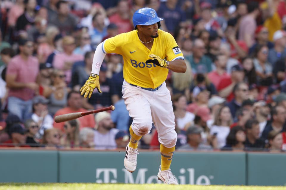 Boston Red Sox's Xander Bogaerts runs up the baseline on his RBI single during the fifth inning of a baseball game against the Baltimore Orioles, Saturday, Sept. 18, 2021, in Boston. (AP Photo/Michael Dwyer)