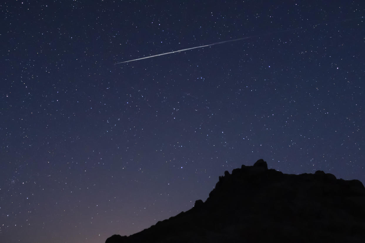 Long exposure at night of Space X "Starlink"  train, multiple satellites recently launched.