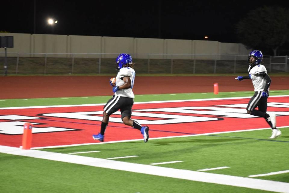 Fort Worth Dunbar’s Ben Smith (10) takes it into the end zone during a high school football game against Fort Worth Diamond Hill-Jarvis at Clark Stadium in Fort Worth, Texas Thursday, September 21, 2023.