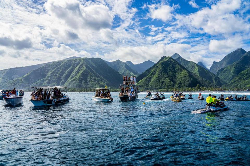 Spectators on boats in Teahupo’o during last year’s Tahiti Pro