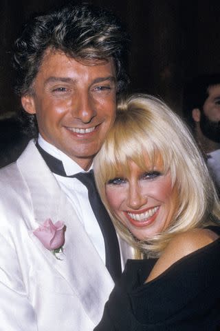 <p>Denise Truscello/Getty</p> Barry Manilow and Suzanne Somers in 1978