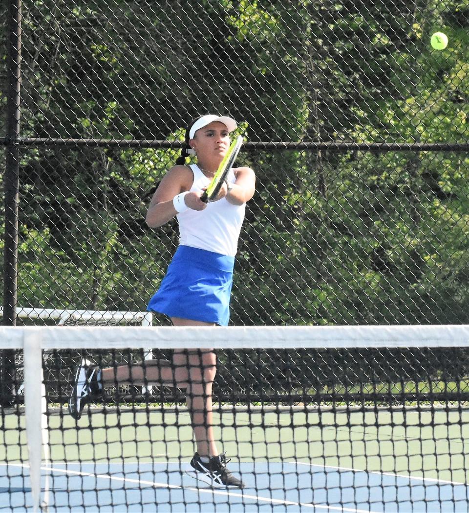 Bre Davis, part of the Patriots' number one doubles team, hits the backhand return. Davis and her partner, Grace Coryea won both their sectional semifinal and final matches and advance to the individual final this week.