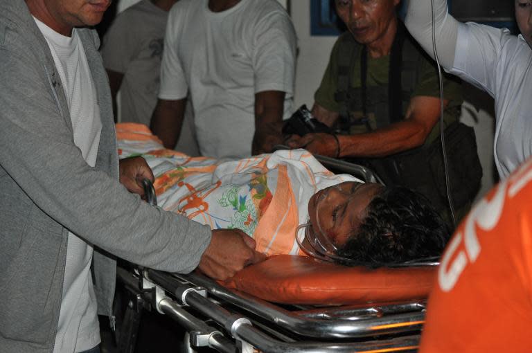 One of the injured victims of a bomb explosion near a mosque is wheeled into a hospital in Jolo town, on the southern Philippine island of Mindanao, on May 29, 2015