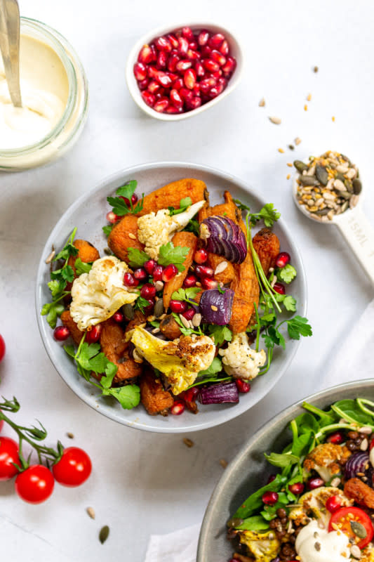 <p>Nourishing Amy</p><p>Tender toasted cumin carrots and golden cauliflower with protein-packed lentils and a green leaf salad with fresh tomatoes. Served with a thick, creamy and easy homemade cashew cheese, this vegan, gluten-free and balanced salad is great for lunch or dinner.</p><p><strong>Get the recipe: <a href="https://nourishingamy.com/2020/03/02/roasted-cumin-carrot-lentil-salad-with-cashew-cheese/" rel="nofollow noopener" target="_blank" data-ylk="slk:Roasted Cumin Carrot Lentil Salad with Cashew Cheese;elm:context_link;itc:0;sec:content-canvas" class="link ">Roasted Cumin Carrot Lentil Salad with Cashew Cheese</a></strong></p>
