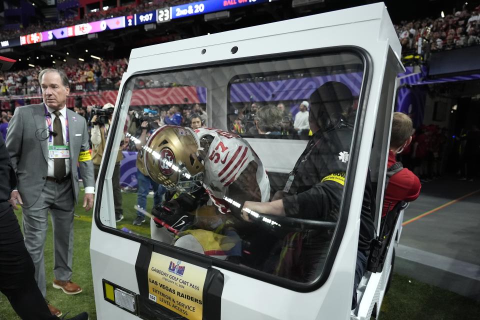 San Francisco 49ers linebacker Dre Greenlaw (57) is taken off the field after an injury against the Kansas City Chiefs during the first half of the NFL Super Bowl 58 football game Sunday, Feb. 11, 2024, in Las Vegas. (AP Photo/Ashley Landis)