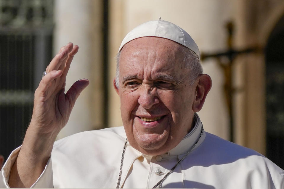 Pope Francis leaves his weekly general audience in St. Peter's Square at The Vatican, Wednesday, Oct. 5, 2022. (AP Photo/Alessandra Tarantino)