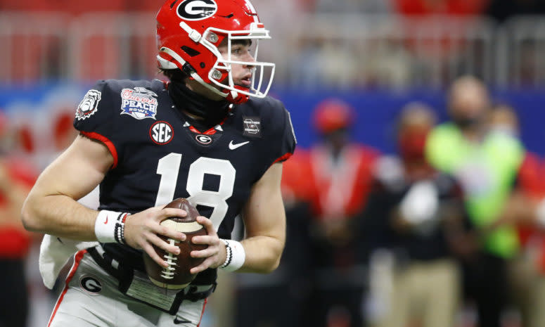 JT Daniels drops back to pass.