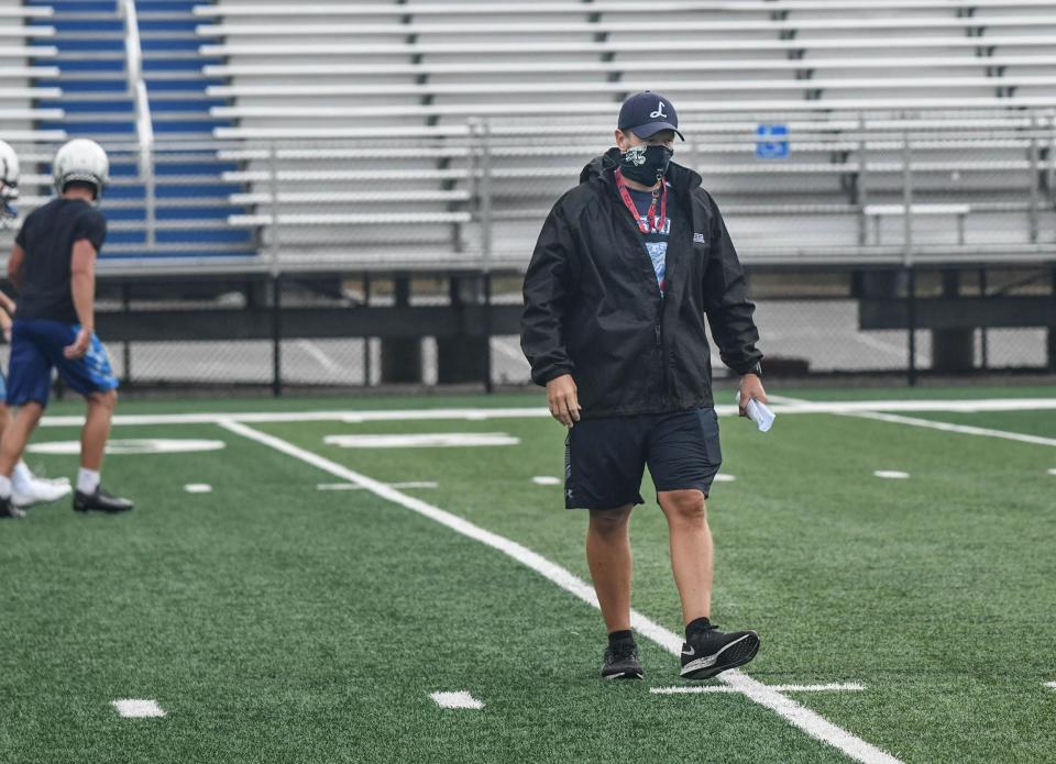 Troy Davis runs the first official practice of the 2020 season for the Louisville Leopards in his first year as head coach, Aug. 1, 2020.