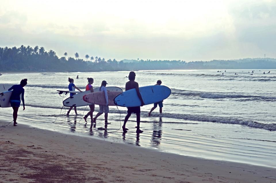 <p><span>Catch a wave on Sri Lanka's beautiful south coast, before stretching your body and mind on a yoga mat as the sun sets. <a rel="nofollow noopener" href="http://soulandsurf.com" target="_blank" data-ylk="slk:Soul and Surf;elm:context_link;itc:0;sec:content-canvas" class="link ">Soul and Surf</a> has recently opened a hotel between Galle and Weligama, and a week's stay there costs from £675pp, including a double room on a full-board basis, and all daily surf and yoga sessions. [Photo: Soul and Surf]</span> </p>