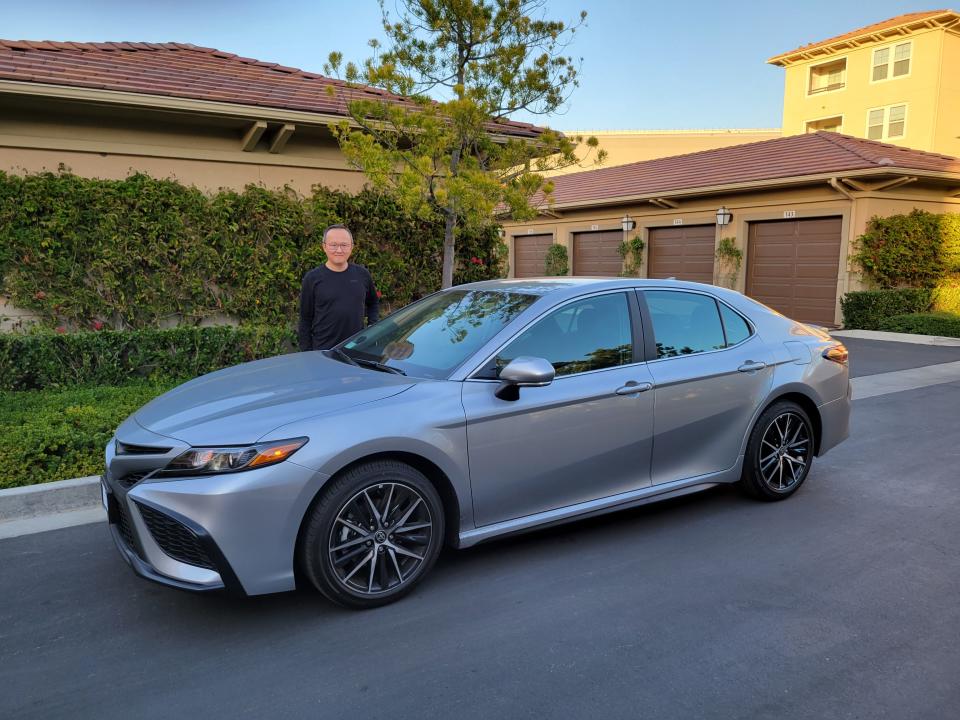 Eric Young bought a 2021 Toyota Camry. "Buying a used car for me is tough," he says.