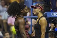 Serena Williams of the U.S. (L) talks to Vitalia Diatchenko of Russia after Diatchenko retired from their match after an injury at the U.S. Open Championships tennis tournament in New York, August 31, 2015. REUTERS/Lucas Jackson