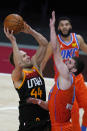 Oklahoma City Thunder guard Svi Mykhailiuk, right, defends against Utah Jazz forward Bojan Bogdanovic (44) during the first half of an NBA basketball game Tuesday, April 13, 2021, in Salt Lake City. (AP Photo/Rick Bowmer)