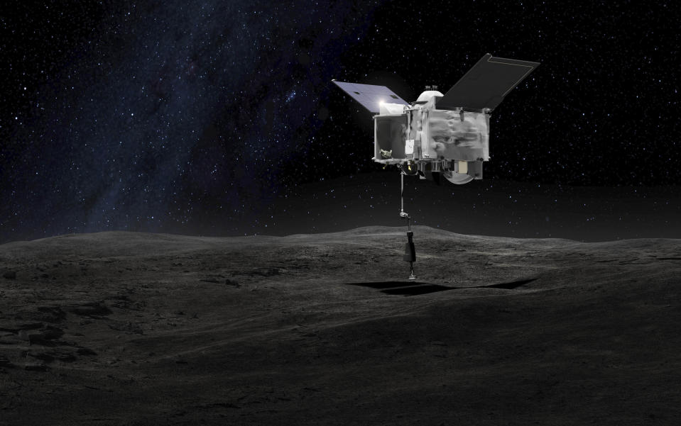 FILE - This artist's rendering made available by NASA on Tuesday, Sept. 6, 2016 shows the Origins Spectral Interpretation Resource Identification Security - Regolith Explorer (OSIRIS-REx) spacecraft contacting the asteroid Bennu with the Touch-And-Go Sample Arm Mechanism. (NASA/Goddard Space Flight Center via AP)