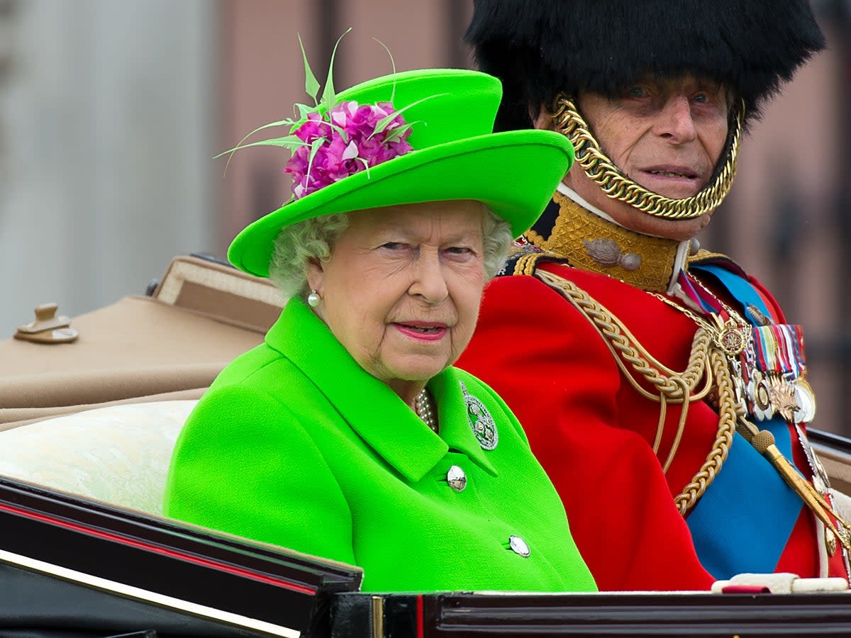 Queen Elizabeth II and Prince Philip, Duke of Edinburgh sit in a carriage during the Trooping the Colour parade, 11 June 2016 (Getty Images)