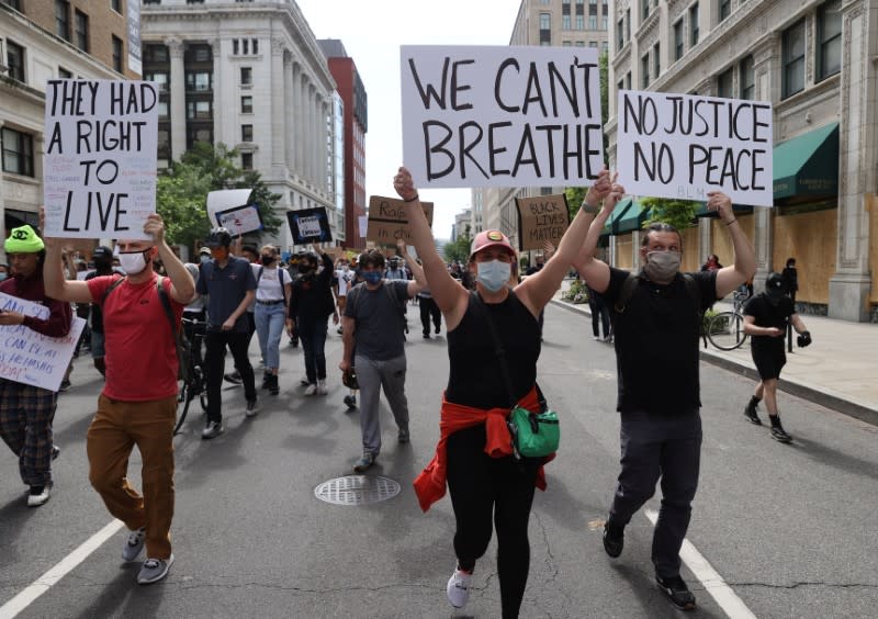 Demonstrators protest against racial inequality outside the White House in Washington