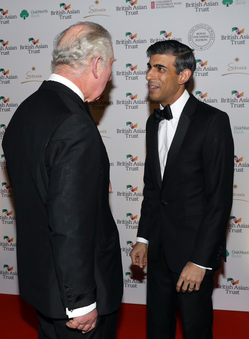 The Prince of Wales speaks to Chancellor of the Exchequer Rishi Sunak as they attend a reception to celebrate the British Asian Trust at the British Museum, in London. Picture date: Wednesday February 9, 2022.