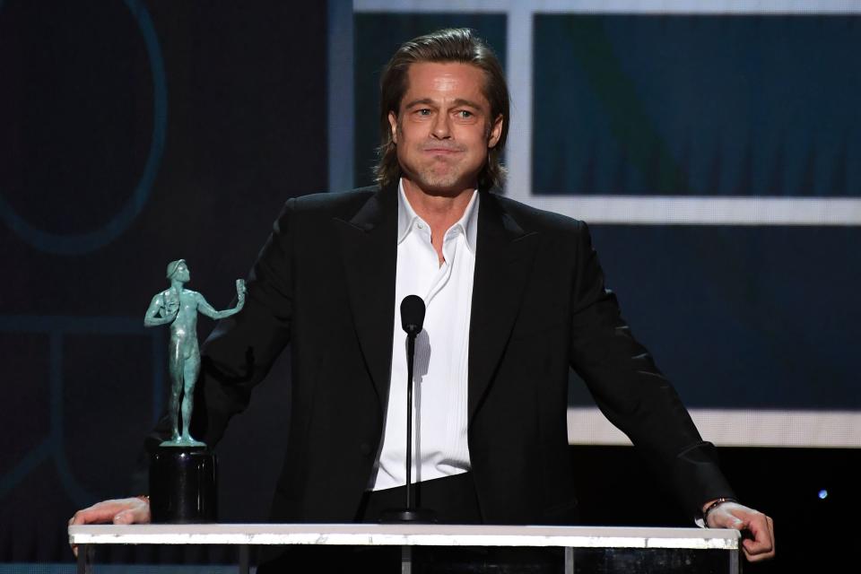 Brad Pitt accepts the award for Outstanding Performance by a Male Actor in a Supporting Role in a Motion Picture at the 26th Annual Screen Actors Guild Awards in Los Angeles on Sunday. (Photo: ROBYN BECK/AFP via Getty Images)