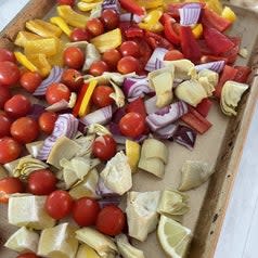 fresh vegetables on a sheet pan
