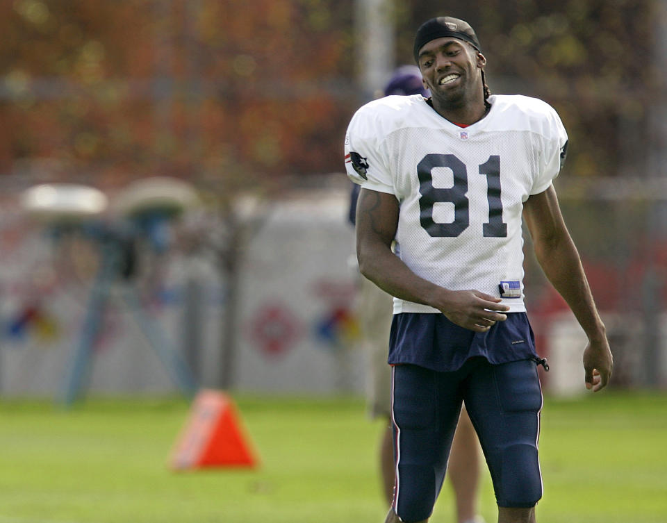 Randy Moss was traded to the New England Patriots in 2007, and the Hall of Fame receiver was revitalized. He caught an NFL-record 23 touchdowns that season. (AP)
