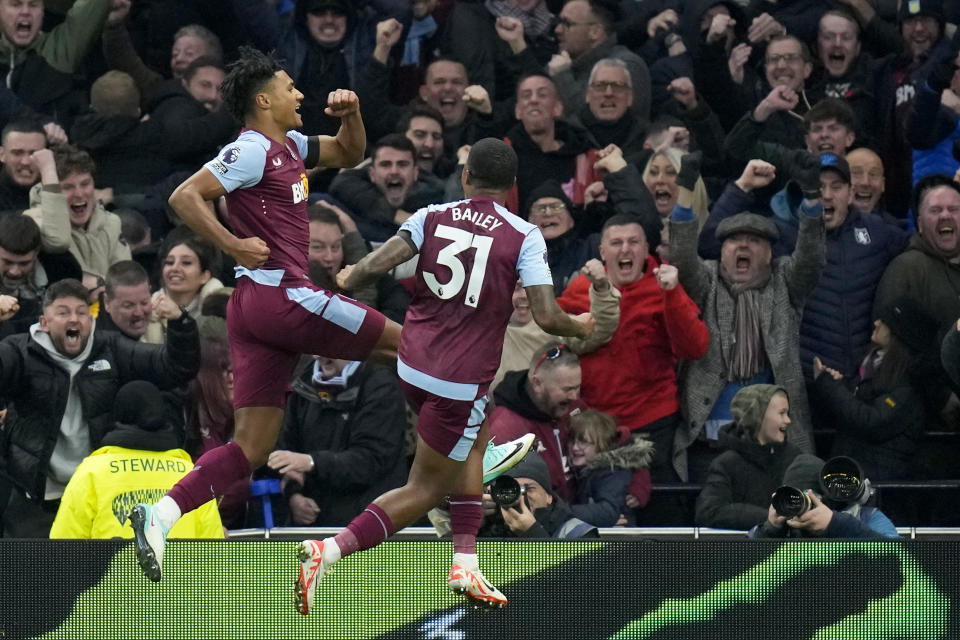 Aston Villa's Ollie Watkins, left, celebrates after scoring his side's second goal during the English Premier League soccer match between Tottenham Hotspur and Aston Villa at the Tottenham Hotspur stadium in London, Sunday, Nov. 26, 2023. (AP Photo/Kirsty Wigglesworth)