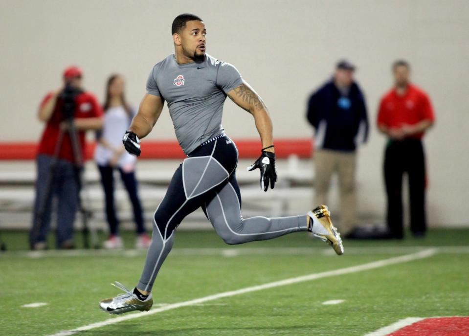 Dan Herron takes part in pro day workouts at Ohio State in 2012.