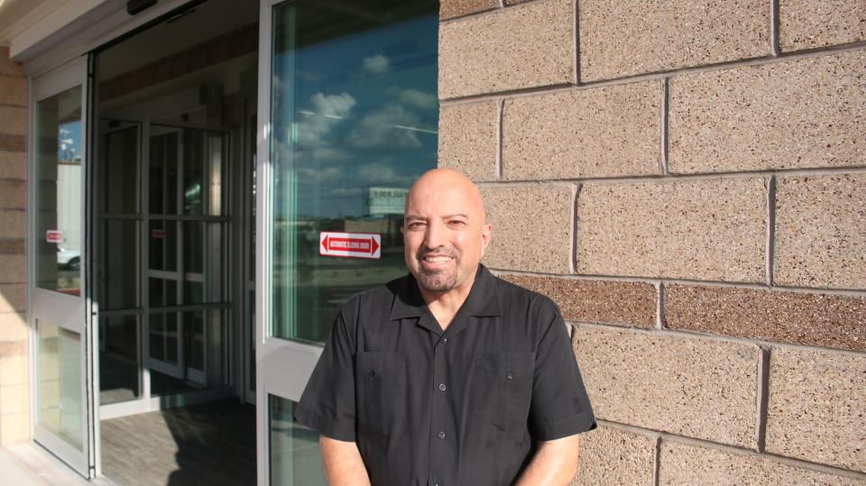 Diego Santistevan, senior designer with Huitt Zollars who worked on the Casa de Peregrinos facility, explained how elements of the building were meant to resemble a grocery store and create a welcoming space. Santistevan was among attendees Friday, Aug. 11, 2023 at a grand opening event in Las Cruces.