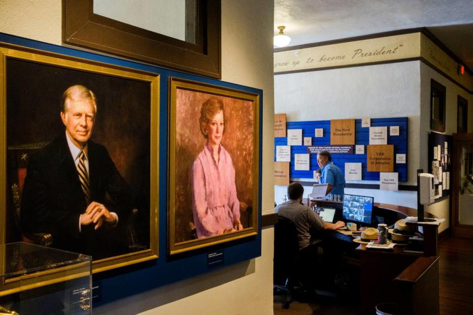Portraits of Jimmy Carter and his wife Rosalynn hang in the hallway of the former Plains High School, Carter’s alma mater and now the centerpiece of the Jimmy Carter National Historic Site. 