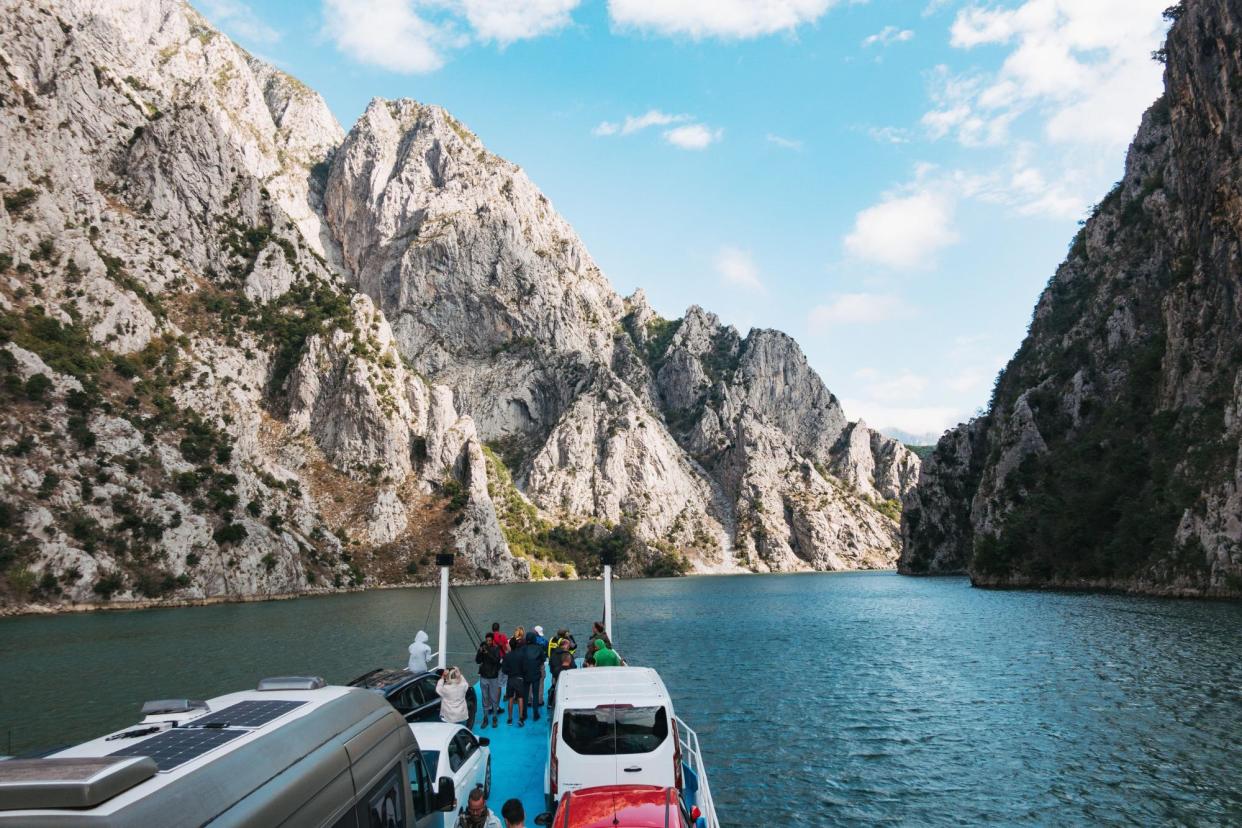 <span>One of our tipsters took the car ferry on the Drin River near Koman, Albania, rather than drive the twisting mountain road.</span><span>Photograph: Hugh Mitton/Alamy</span>