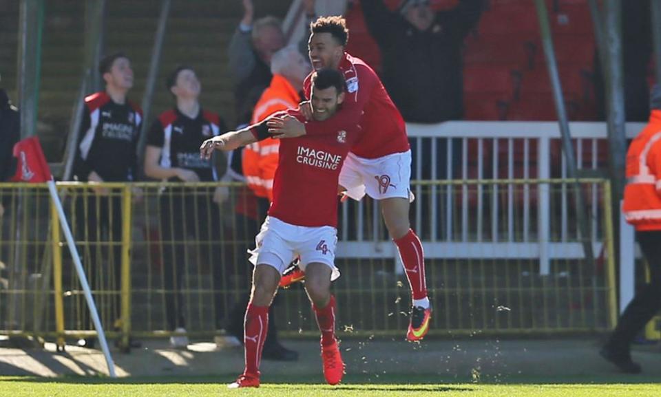 Swindon's Conor Thomas celebrates his last minute goal against Millwall.